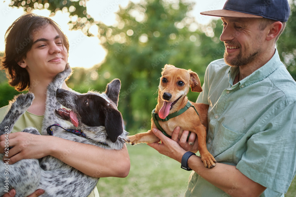 Φωτογραφία Support, care or happy family, men and kids bonding with foster puppy or pet and enjoying time together