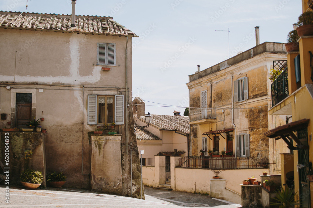 Fototapeta premium Old historic buildings in small Italian town. Traditional European architecture. Summer travel