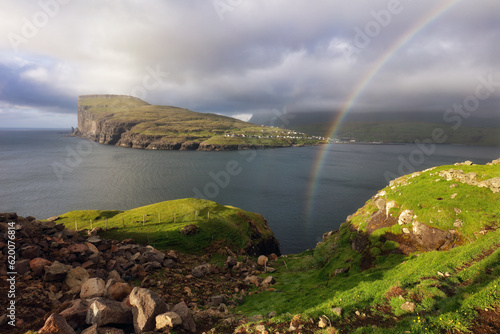 Faroe Islands landscape with rainbow, view of Risin and Kellingin, the giant and the witch view from Tjornuvik.