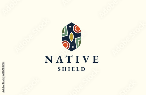 The Native Shield logo encapsulates a spirit of unity, resilience, and reverence for nature. a vibrant color palette inspired by the rich hues found in the natural world.