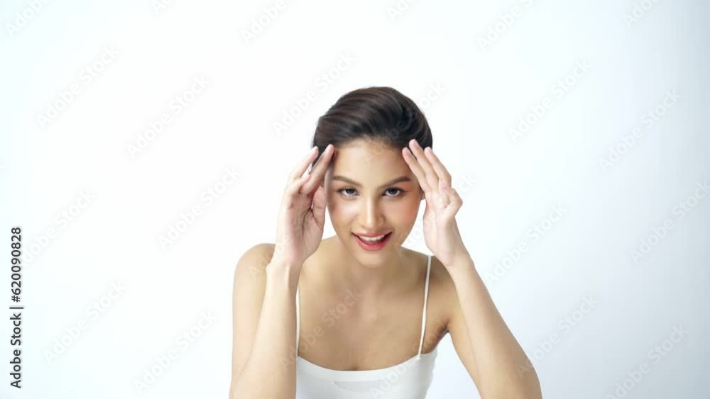 Beautiful Young asian Woman with Clean Fresh Skin on white background, Face care, Facial treatment, Cosmetology, beauty and spa, Asian women portrait Beautiful Young asian Woman with Clean Fresh Skin on white background, Face care, Facial treatment, Cosmetology, beauty and spa, Asian women portrait