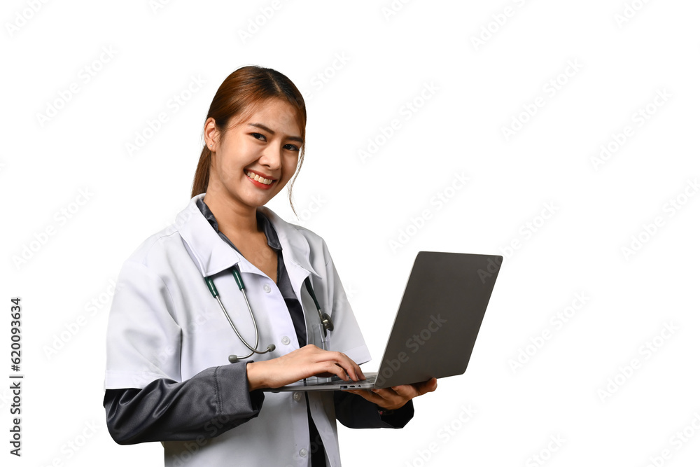 Portrait of female doctor in white coat with stethoscope holding laptop against white background. Health care concept Portrait of female doctor in white coat with stethoscope holding laptop against white background. Health care concept