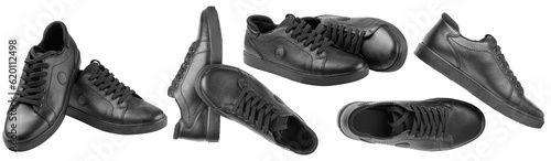 black leather sneakers on a transparent white background close up