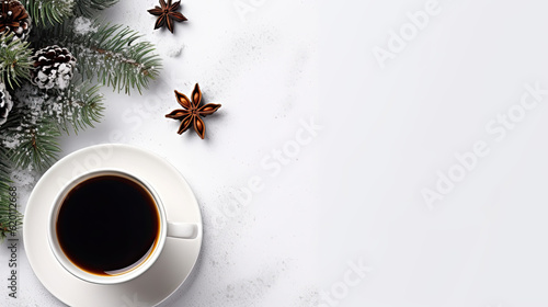 A cup of espresso or black tea on a white surface decorated in Christmas 