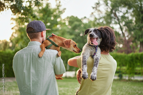 Support, care or happy family, men and kids bonding with foster puppy or pet and enjoying time together. High quality photo