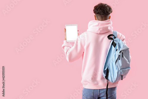 Male student with tablet co...