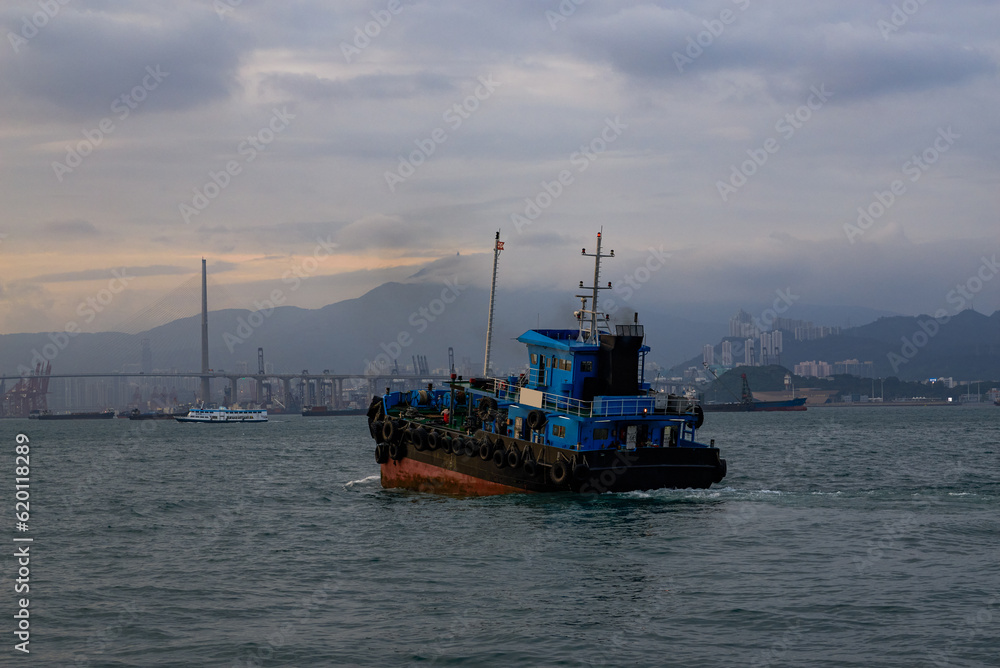 Large fishing boats docked by the sea in Hong Kong