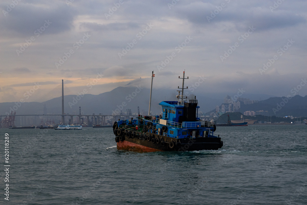 Large fishing boats docked by the sea in Hong Kong Large fishing boats docked by the sea in Hong Kong