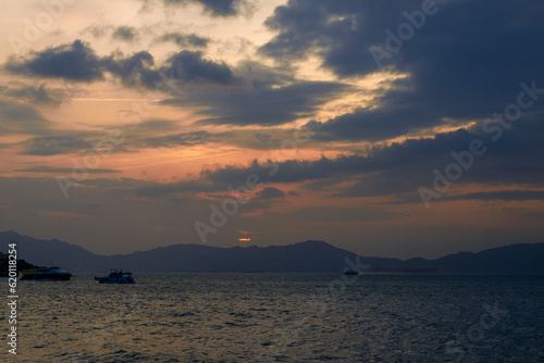 Sunset view over the sea at Kennedy Town, Western District, Hong Kong photo