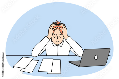 Unhappy businessman sitting art desk with laptop having financial problems. Stressed man have debt and finance troubles at work. Vector illustration.