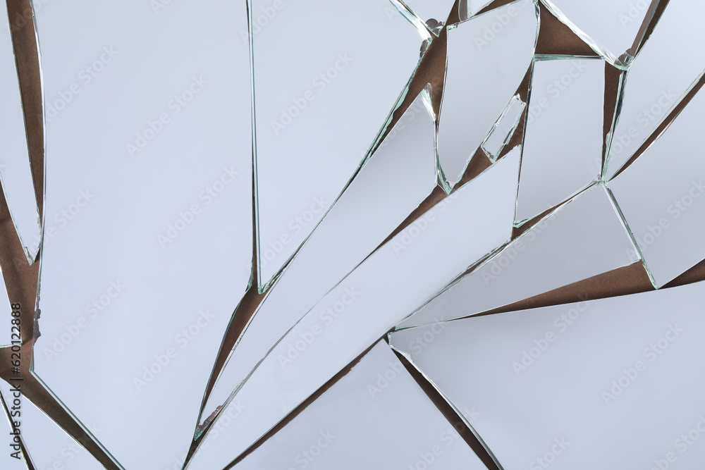 Photo & Art Print Shards of broken mirror on backing board, top