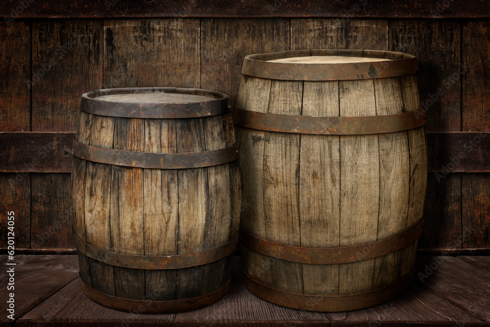 Wooden barrels on brown shelf near textured wall Wooden barrels on brown shelf near textured wall