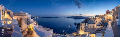 Oia panorama at night, Santorini, Greece photo