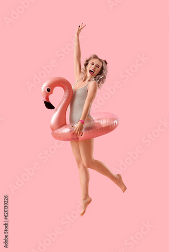 Young woman in swimsuit wit...