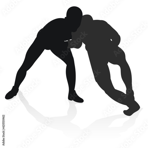 Image of a silhouette of a wrestler athlete in a fighting pose. Greco Roman wrestling, combating, duel, fight, martial art, sportsmanship