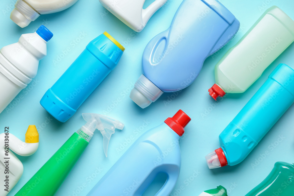 Many bottles of detergent on blue background Many bottles of detergent on blue background