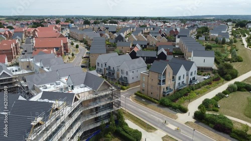 Aerial view of new housing development panning right. Beaulieu Park is a rapidly expanding new housing development in the suburbs of Chelmsford, Essex, UK. photo