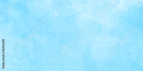 blue sky with clouds. Light sky blue shades watercolor background.Grunge blue background with space for text,watercolor abstract painting of blue grunge texture.	