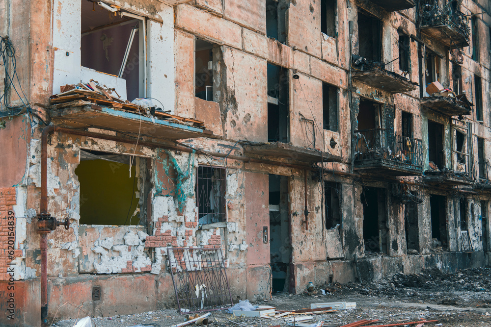 Residential building destroyed by rocket attack. War in Ukraine. Terror of the civilian population