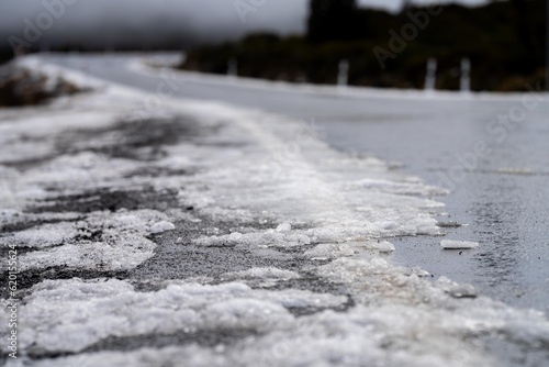 ice on the road on a mountain in winter