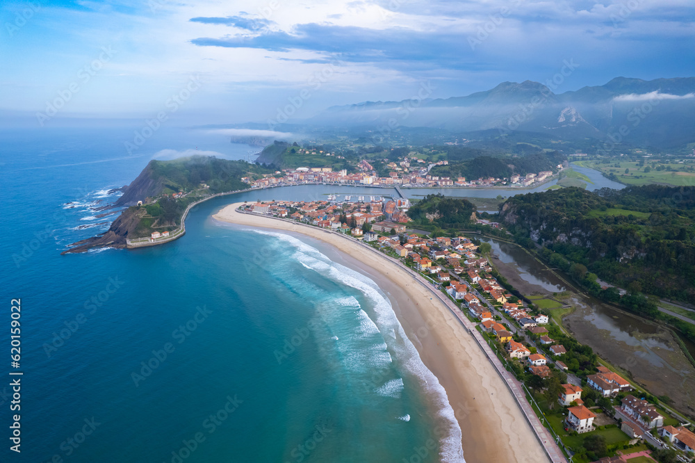 Ribadesella, Spain - Aerial view of the beautiful Spanish seaside village of Ribadesella during summer on the Cantabria Coast Ribadesella, Spain - Aerial view of the beautiful Spanish seaside village of Ribadesella during summer on the Cantabria Coast