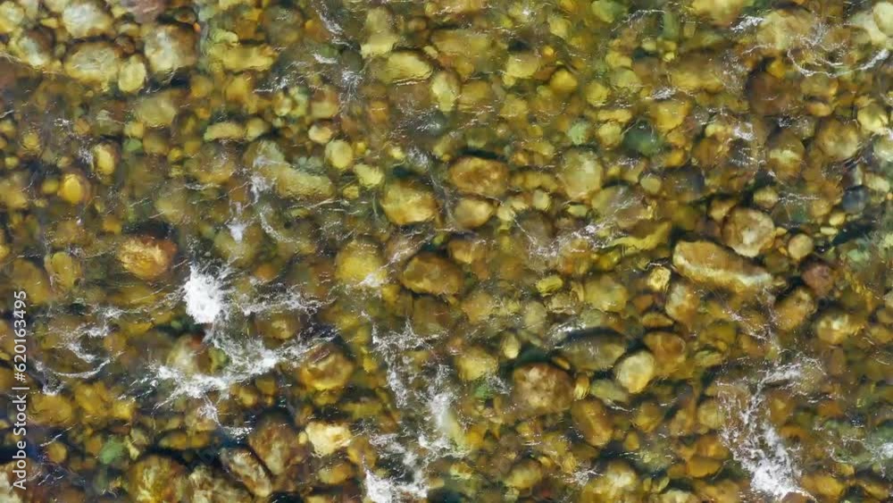 Altai mountains in winter. Rocky bottom of a mountain river Biya. Aerial view. Altai mountains in winter. Rocky bottom of a mountain river Biya. Aerial view.