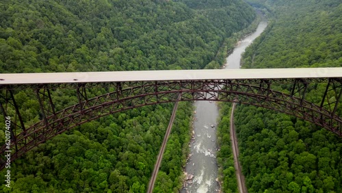 bridge over a gorge and river in New River Gorge National Park and Preserve in West Virginia. Taken from a bird's eye view.