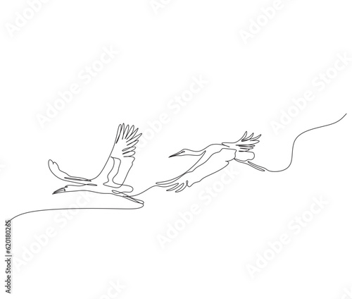 Continuous one line drawing storks flying in sky. Bird as symbol for baby shower, delivery, news, pregnancy. Spring mood concept. Bird life nature. Single line draw design vector graphic illustration