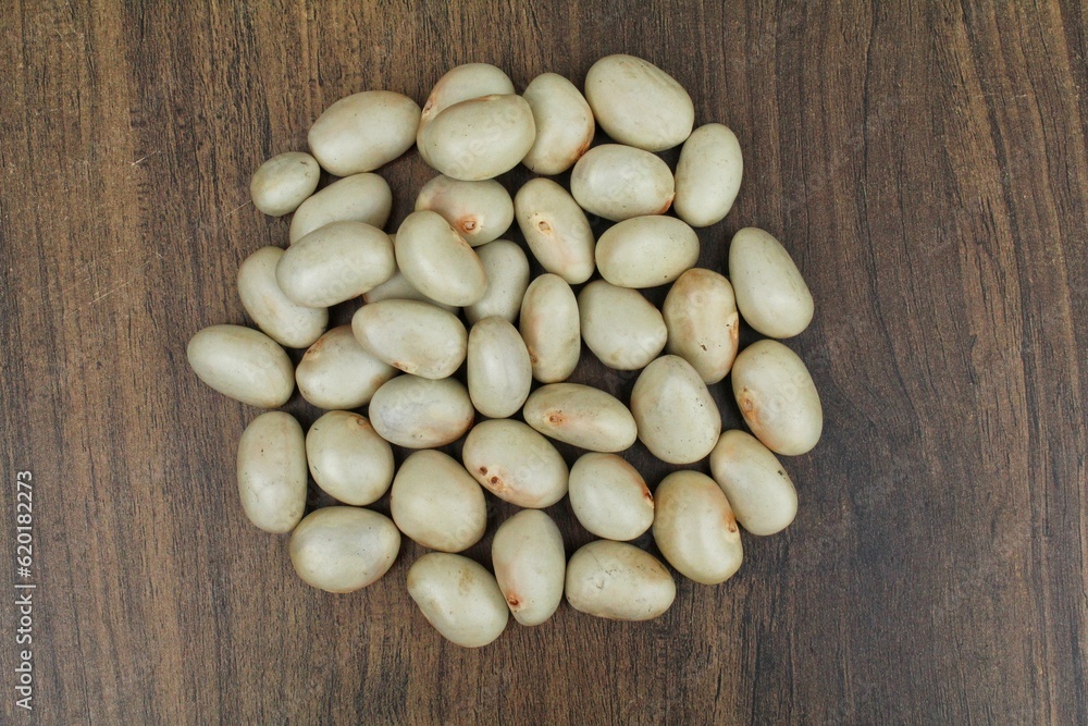 Jackfruit seeds on wooden background top view Jackfruit seeds on wooden background top view