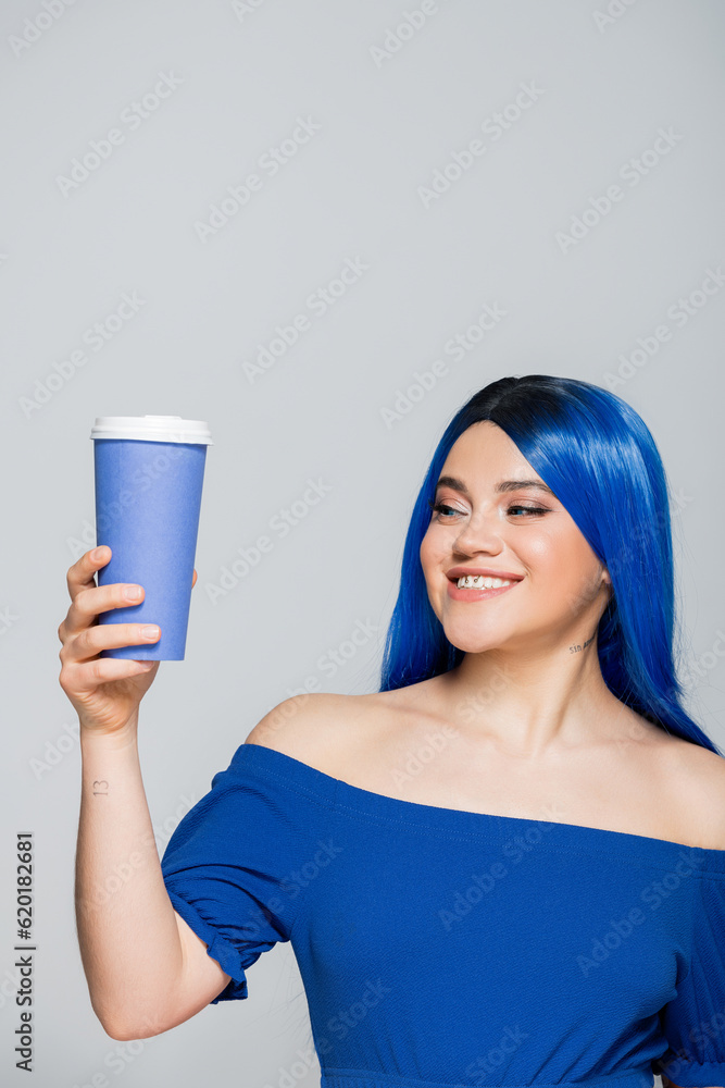 paper cup, energy, happy young woman with blue hair and eyes holding coffee to go on grey background, takeaway, caffeine, tattoo, vibrant color, self expression, individualism paper cup, energy, happy young woman with blue hair and eyes holding coffee to go on grey background, takeaway, caffeine, tattoo, vibrant color, self expression, individualism