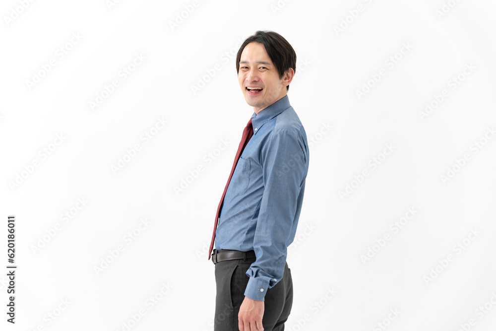 笑顔で振り返るビジネスマン 笑顔で振り返るビジネスマン