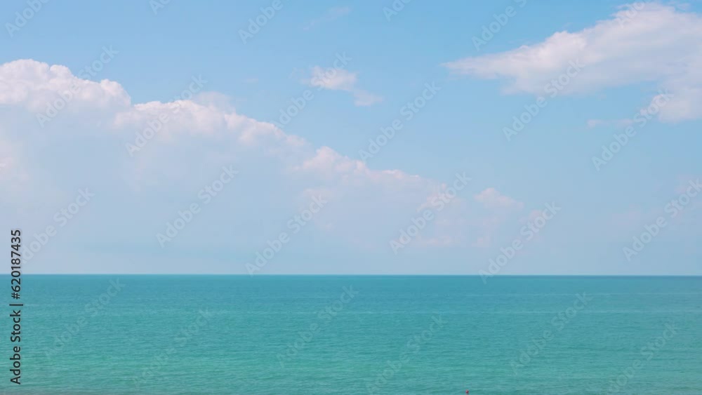 Blue Sea Puffy White Clouds in Azure Sky Time Lapse. Paradise, Island, Beach. Blue Skyscraper with Cumulus White Clouds and Turquoise Ocean. Vacation, Tourism. Beautiful Seascape 4K. Blue Sea Puffy White Clouds in Azure Sky Time Lapse. Paradise, Island, Beach. Blue Skyscraper with Cumulus White Clouds and Turquoise Ocean. Vacation, Tourism. Beautiful Seascape 4K.
