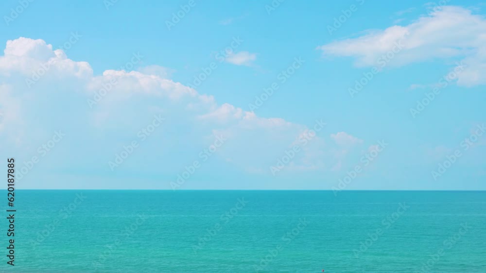 Cumulus White Clouds in Blue Sunny Sky over Turquoise Sea Time Lapse. Blue Cloudy Skyscraper over Ocean Timelapse. Beautiful Seascape. Nature Background 4K. Travel, Summer Vacation, Holidays. Cumulus White Clouds in Blue Sunny Sky over Turquoise Sea Time Lapse. Blue Cloudy Skyscraper over Ocean Timelapse. Beautiful Seascape. Nature Background 4K. Travel, Summer Vacation, Holidays.