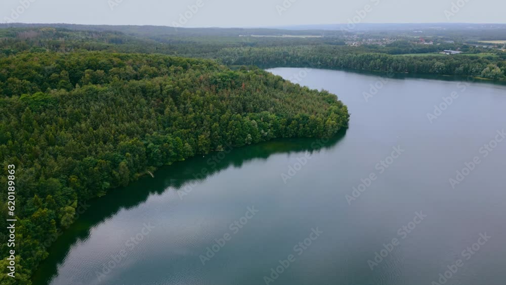 Aerial drone view of lake among forest, Nordrhein westfalen, Germany in summer day. High quality 4k footage Aerial drone view of lake among forest, Nordrhein westfalen, Germany in summer day. High quality 4k footage