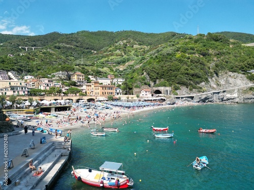 Train passing next to the beach in Monterosso, Liguria, Cinque Terre, Italy 