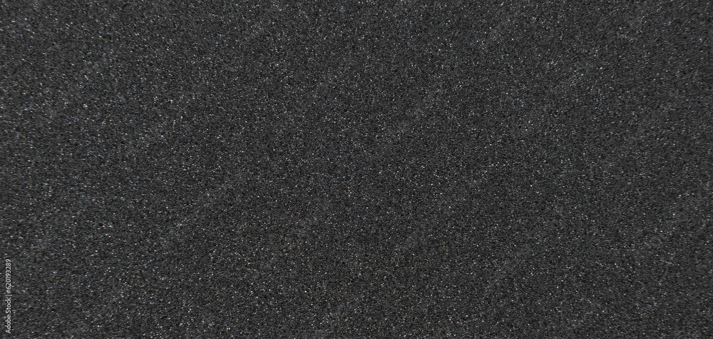 Background filled with black particles. Background filled with black particles.