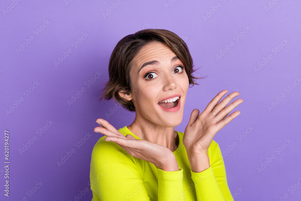 Portrait of young funky girl laugh positive enjoy her boyfriend gift surprised reaction wear yellow top isolated on violet color background Portrait of young funky girl laugh positive enjoy her boyfriend gift surprised reaction wear yellow top isolated on violet color background