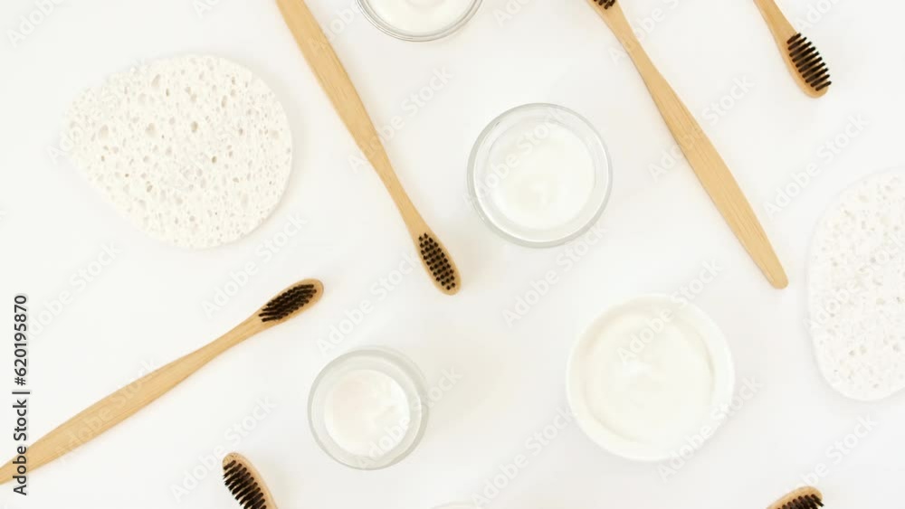 Eco-friendly biodegradable Bamboo toothbrush, White cosmetic bottle containers. Natural skin care products . Zero waste, eco friendly and spa accessories. Beauty SPA branding mockup. No plastic. 4k Eco-friendly biodegradable Bamboo toothbrush, White cosmetic bottle containers. Natural skin care products . Zero waste, eco friendly and spa accessories. Beauty SPA branding mockup. No plastic. 4k