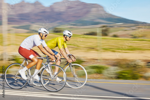Bicycle race  friends and road in motion blur  speed and sports for fitness  countryside and mountains. People  fast bike and men with cycling partnership  workout and training on journey in nature