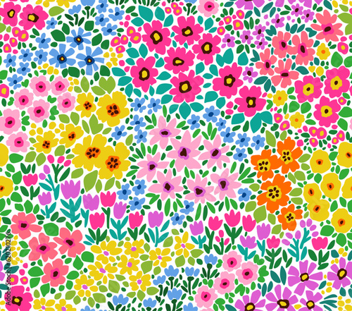 Cute floral pattern in the small flowers. Seamless vector texture. Trendy bright template for fashion prints. Printing with small multicolor flowers. White background. Stock print.