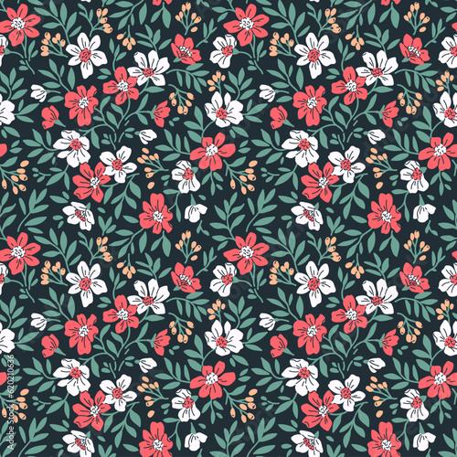 Beautiful floral pattern in small abstract flowers. Small red and white flowers. Dark blue background. Ditsy print. Floral seamless background. Liberty template for fashion prints. Stock pattern. © ann_and_pen
