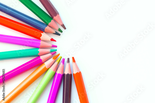 Set of multicolored rainbow pensil isolated on white background photo