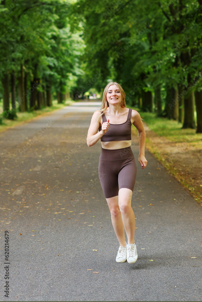 Woman running in the park Woman running in the park