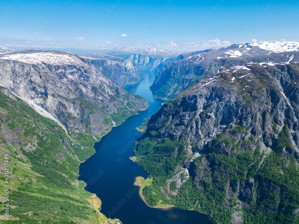 Landscape photo of river or fjord and mountains