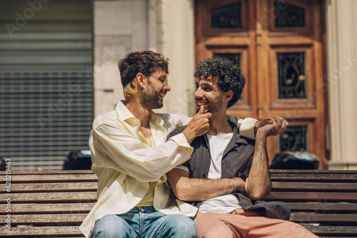 Photography couple walking kissing and huging in the city