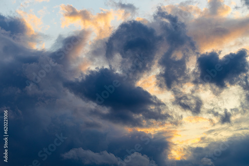 beautiful stormy sky with the sun peeping through.