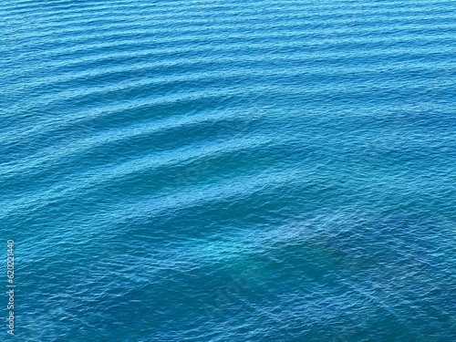 Blue sea water ripples surface. 