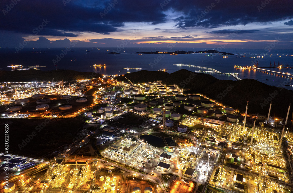 Fototapeta premium Aerial Industry Oil refinery oil and gas refinery background, Business petrochemical industrial, Refinery oil and gas factory power fuel energy, Ecosystem estates. Fuel refinery industry at morning 