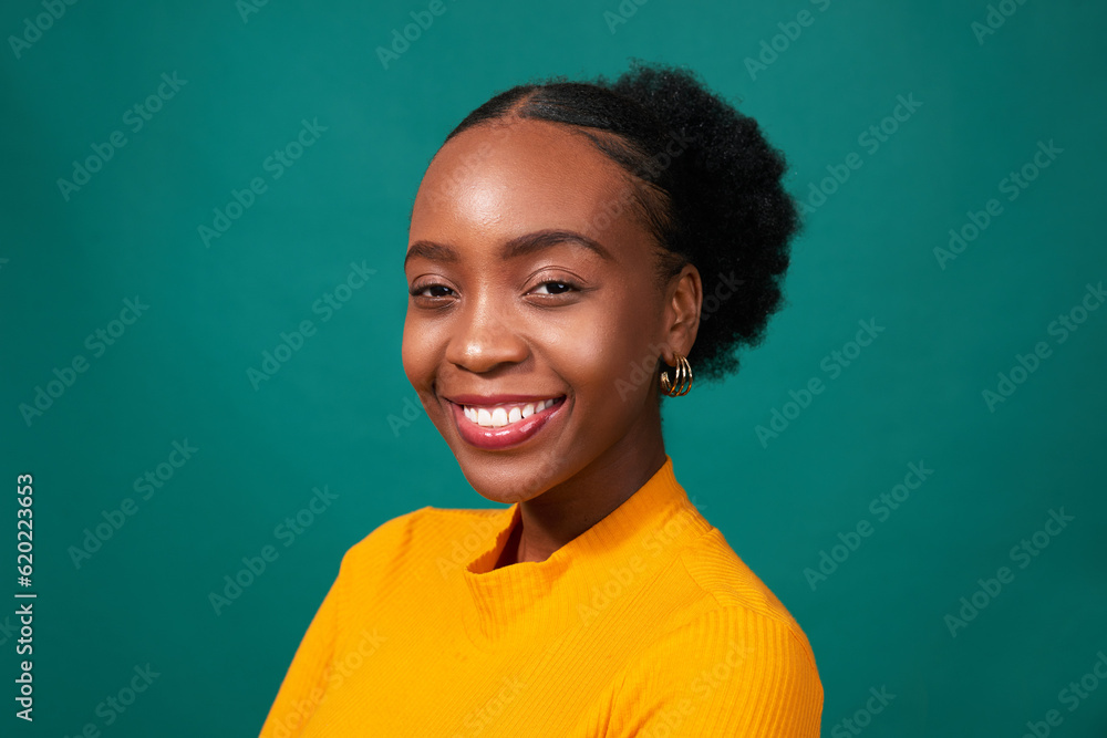 © Meeko Media - Beautiful Black woman smiles, studio teal background, fashion lifestyle portrait © Meeko Media - Beautiful Black woman smiles, studio teal background, fashion lifestyle portrait