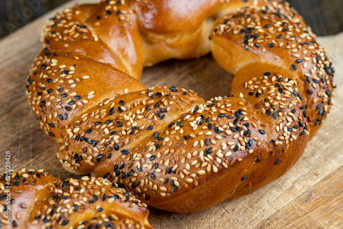 soft and fresh wheat bagel sprinkled with white and black sesame seeds